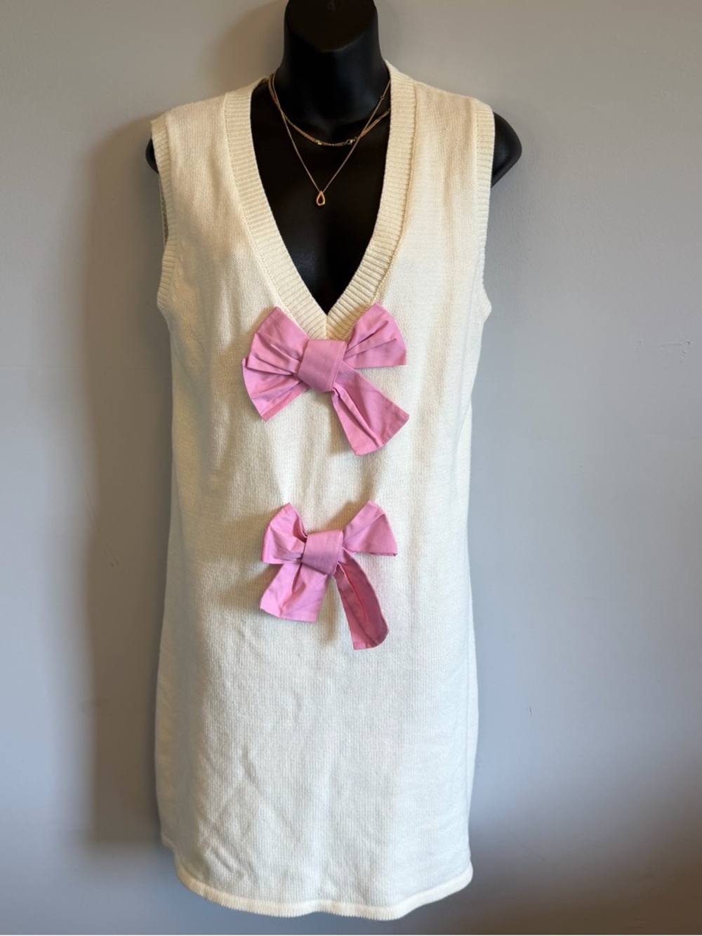Cream Knit Sleeveless Dress with Pink Bow Accents